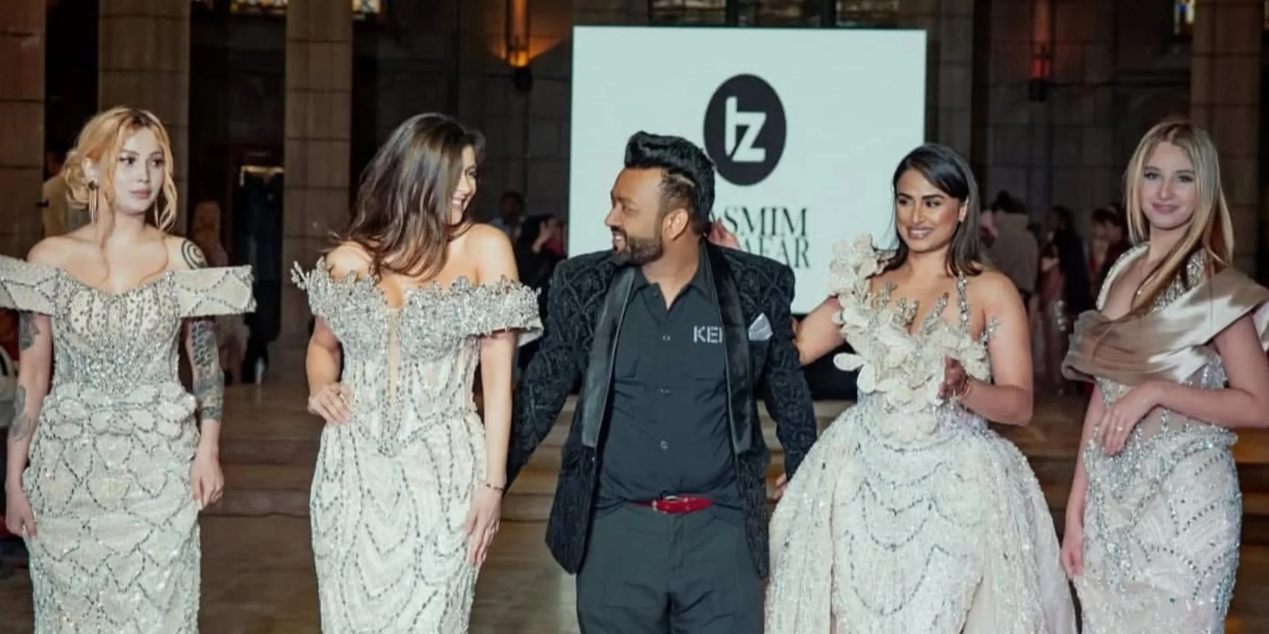 TZ Studio couture presentation featuring a gold crystal-embellished gowns and designer Tasmim Zobaear photographed in Paris.