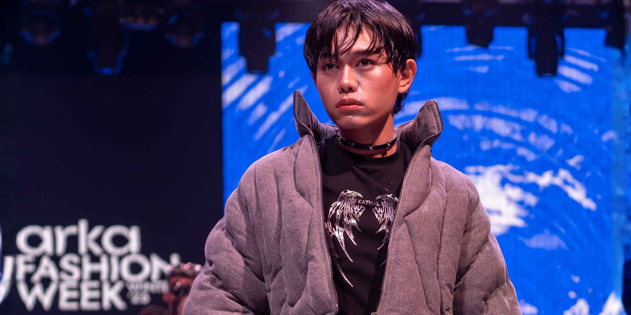 "Model showcasing edgy streetwear from Kathal at Arka Fashion Week Winter'25, Dhaka.”