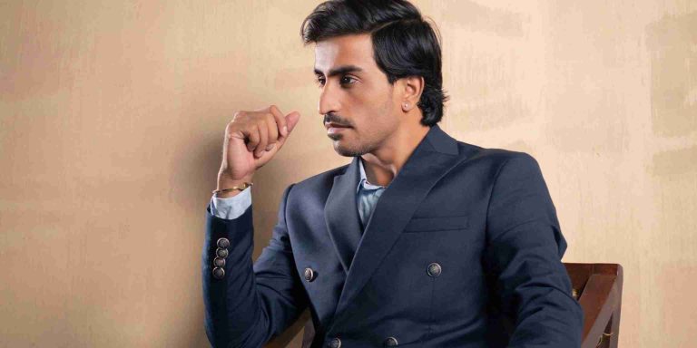 Pakistani actor Jam Emran portrait with cinematic lighting.