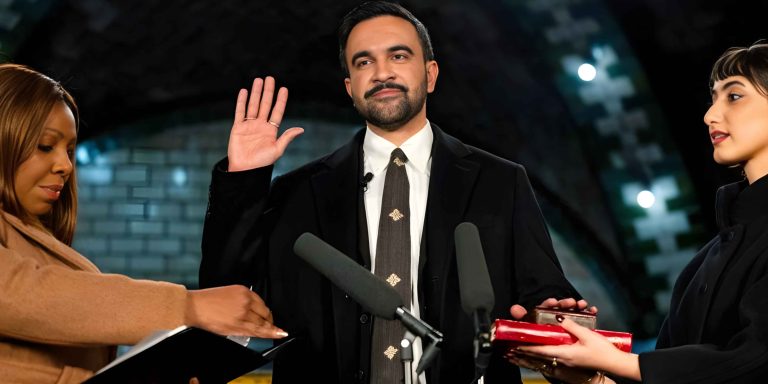 NYC Mayor Zohran Mamdani taking the oath of office administered by Letitia James inside a subway station during his midnight inauguration.