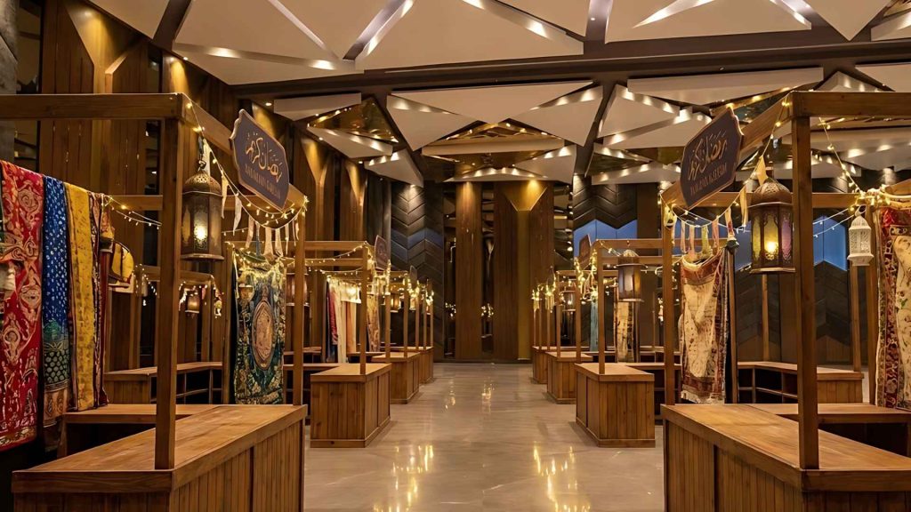 Indoor Ramadan night market in Dhaka featuring festive decorations, lanterns, and premium lifestyle stalls.