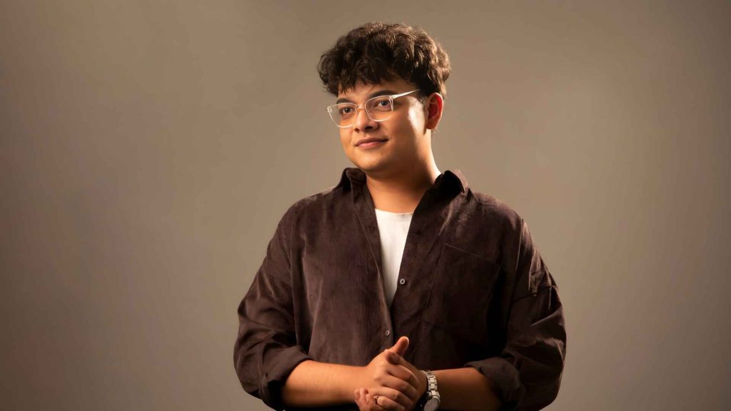 Close-up of Shehab Shahariar focused while producing music, symbolizing creative independence.