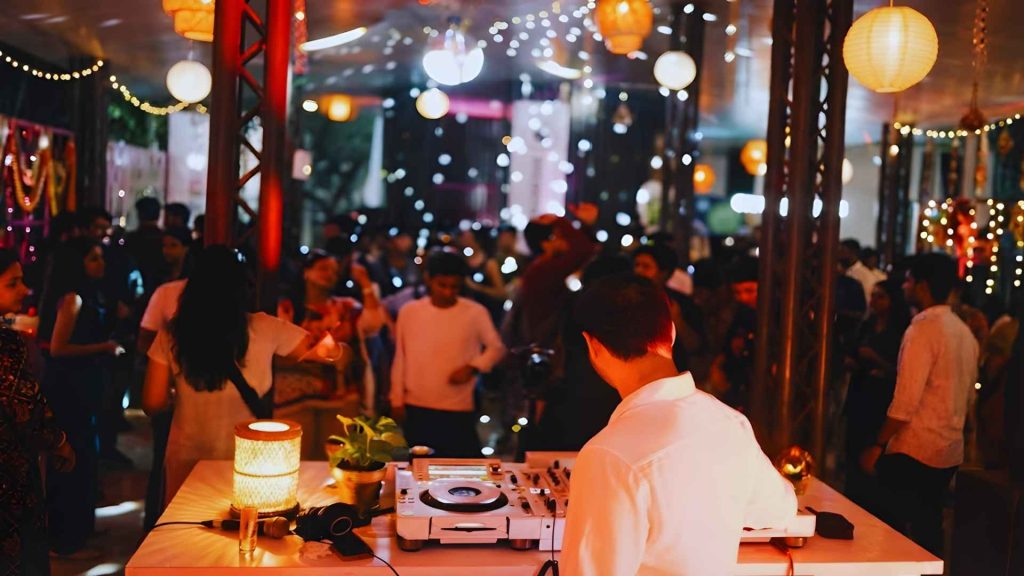 Partygoers celebrating at Breakfast Club’s Colombo takeover, blending Dhaka’s revolutionary morning rave vibe with MACHAN S03E02 energy.