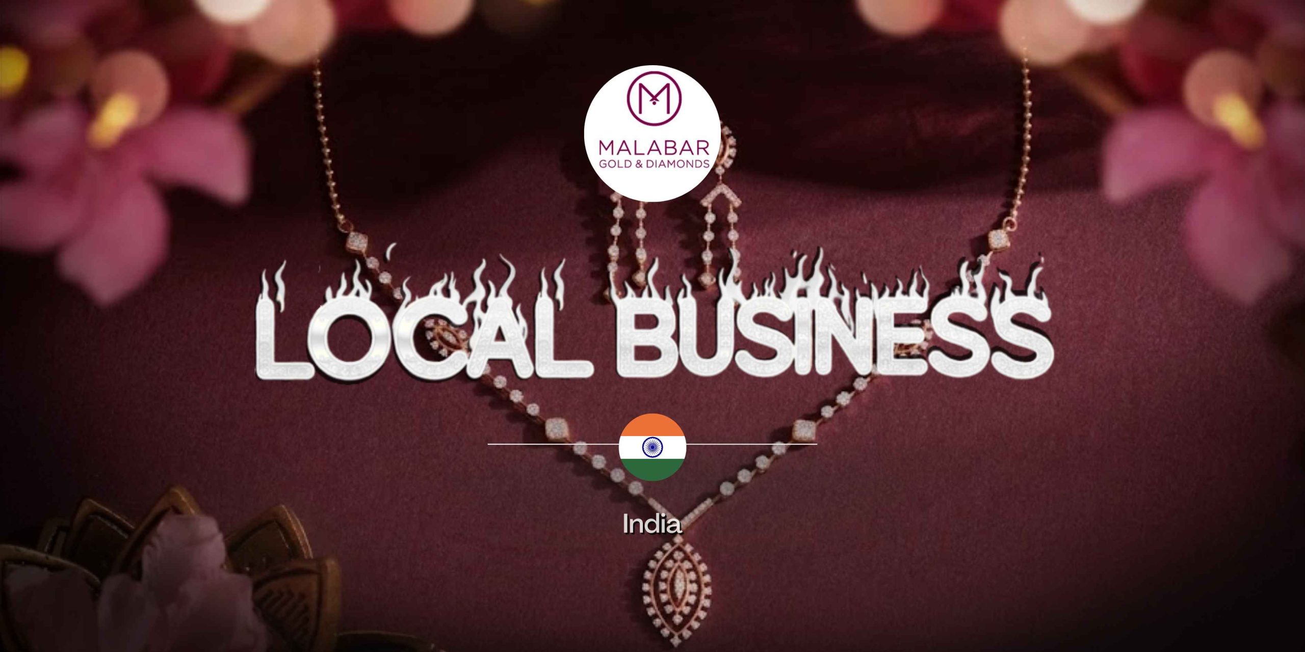 Malabar Gold & Diamonds local business feature banner showcasing Indian heritage jewelry and brand identity.