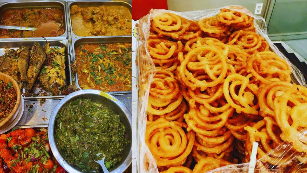 Customers enjoying a wide selection of aromatic rice and meat dishes from the fresh buffet line at Boishakhi Astoria in Queens, NY