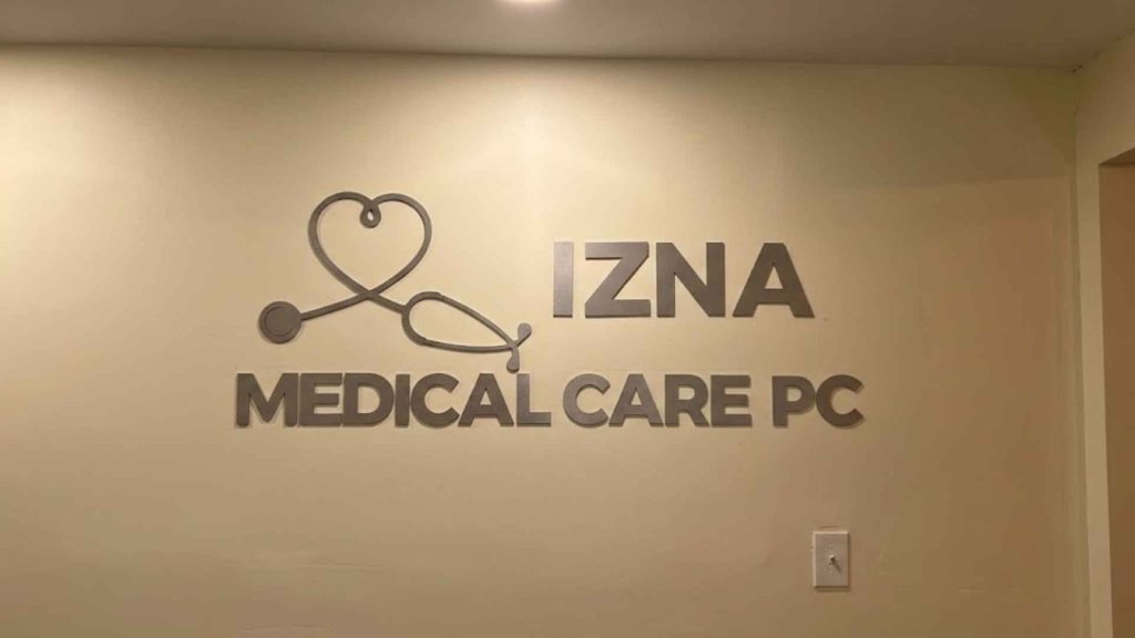Interior of Izna Medical Care PC where Dr. Ishtiaq Hossain treats multi-generational families in a modern clinical setting.